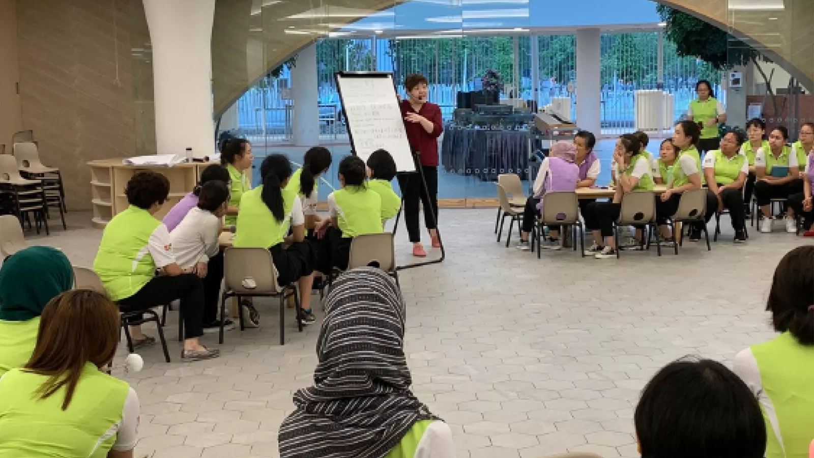 Michelle Lee conducts a workshop for educators at a mega childcare centre.