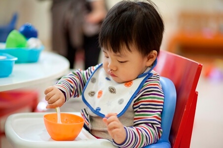 Let baby try Asian style porridge at 8 - 10 months